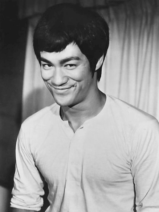 bruce lee smiling